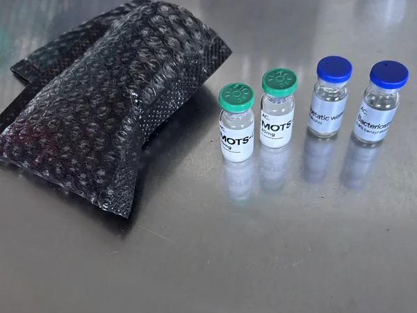 Customer photo: Two vials, two bac water and the bubble mailer, as received