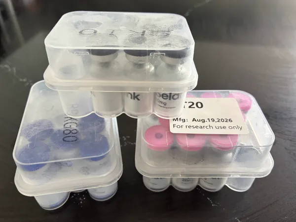 Customer photo: Stacked boxes of vials, as received